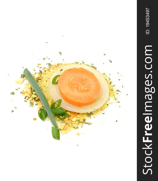 Soup seasoning with fresh onion and carrot isolated on a white background