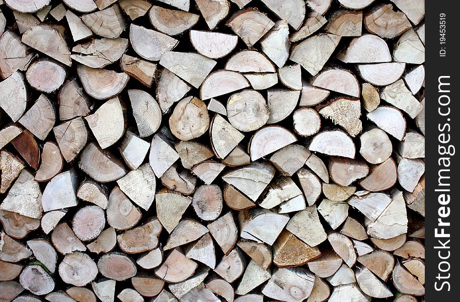 A Neat Pile of Wooden Logs for Firewood. A Neat Pile of Wooden Logs for Firewood.