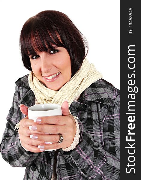 Lady holding a cup of coffee wearing winter clothes. Lady holding a cup of coffee wearing winter clothes