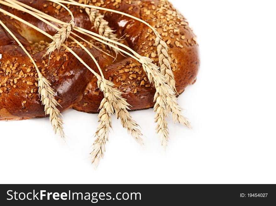 Pretzel dried ears of wheat on a white background. Pretzel dried ears of wheat on a white background.