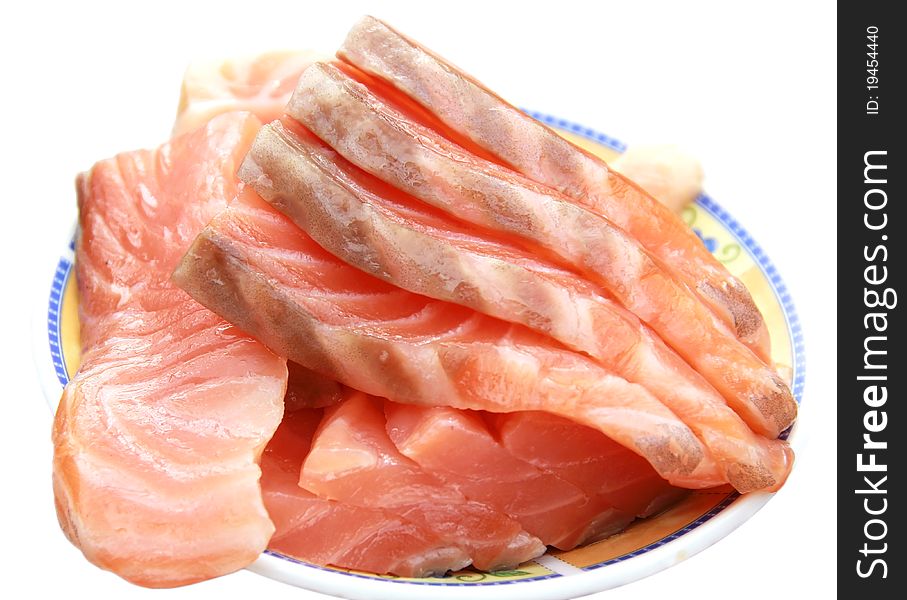 Pieces of salted salmon on plate