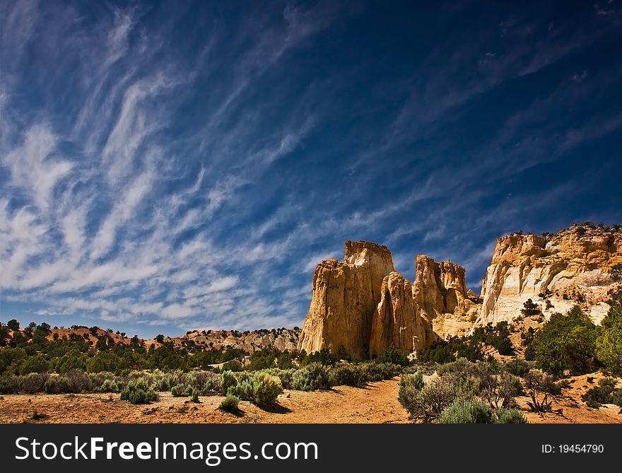 Desert landscape with blazing sky.