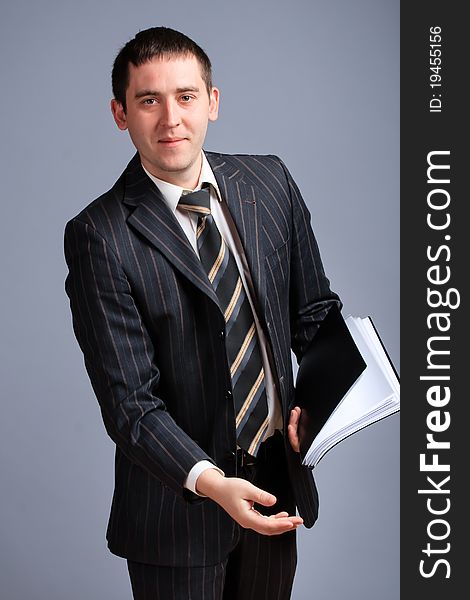 Businessman portrait in a jacket and tie