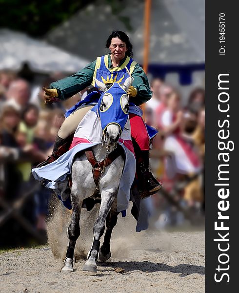 Woman rider to Knight's tournament.