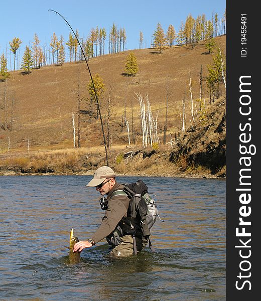 Fishing - fisherman catched big trout