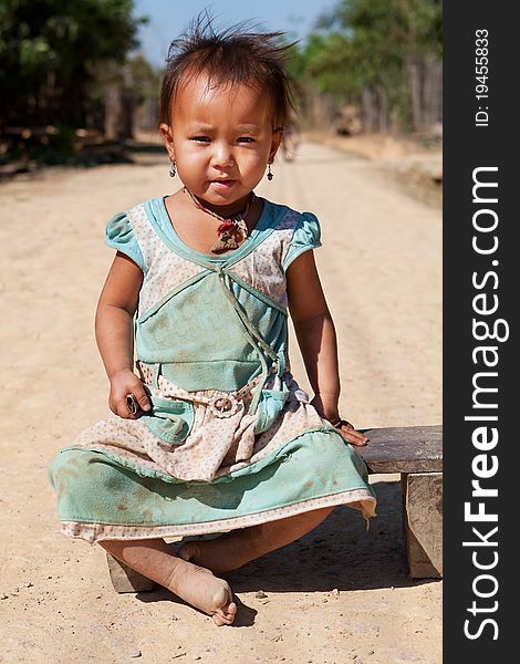 Portrait asian girl, poverty child wirth dirty clothes and face