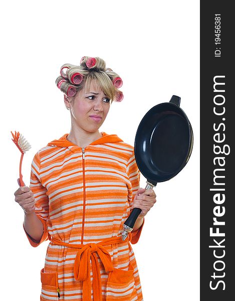 Isolated housewife with a brush and pan
