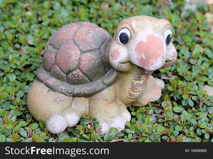 Decorative Turtle Figurine In Garden