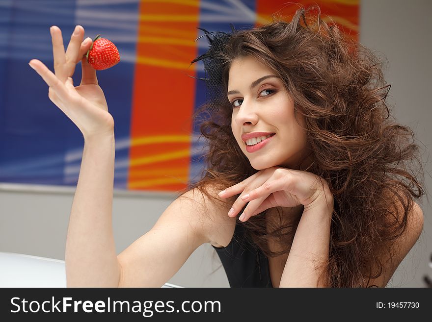 Young Woman With Red Strawberry