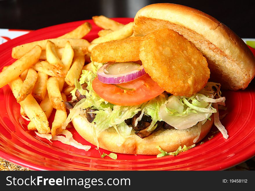 Sandwiches with fried Potato on a red Plate