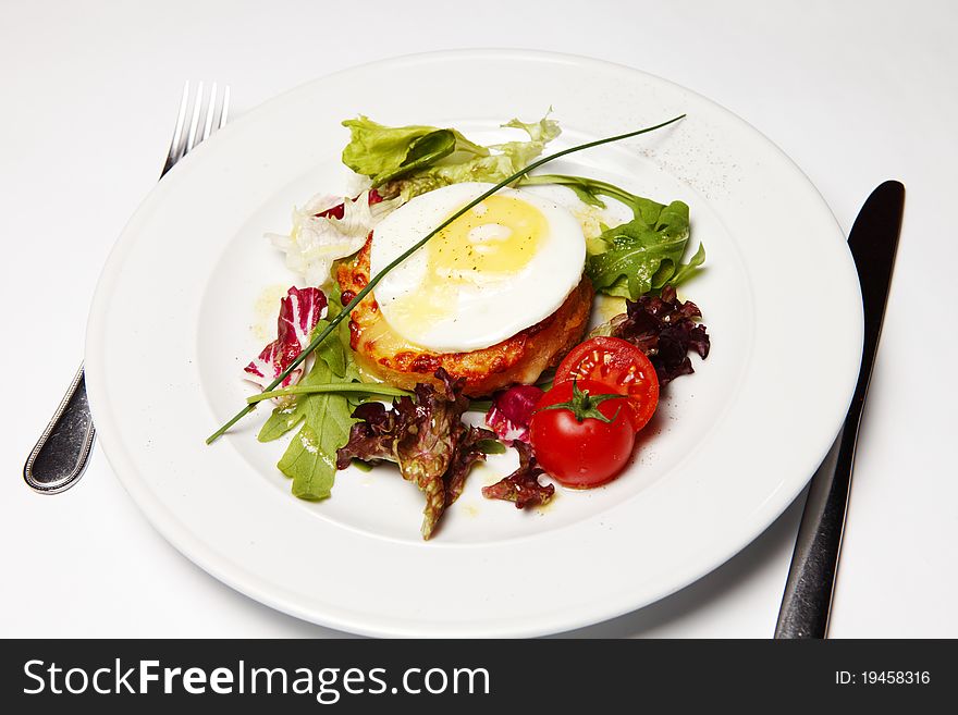 Sandwich on a red plate with tomatos. Sandwich on a red plate with tomatos