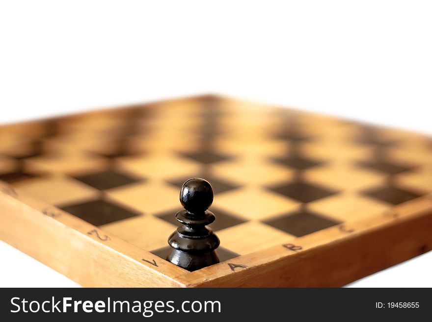 Pawn standing alone in corner of chessboard. Pawn standing alone in corner of chessboard