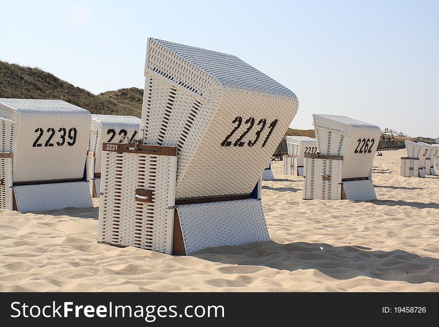 Beach chairs on a sandy beach