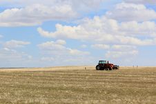 Tractor In Wyoming Field Stock Photo