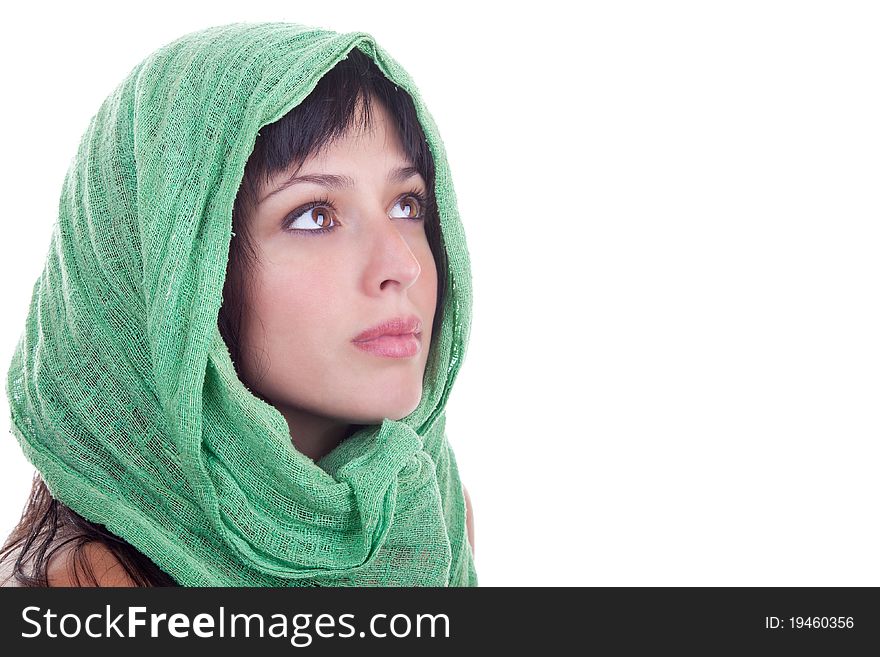 Beautiful female model with a green shawl wrapped around her head, isolated on white. Beautiful female model with a green shawl wrapped around her head, isolated on white.