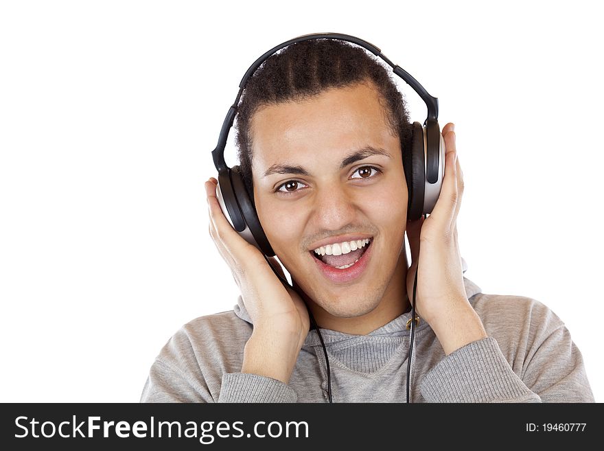 Happy young African man with headphones listens to mp3 music.Isolated on white background. Happy young African man with headphones listens to mp3 music.Isolated on white background.