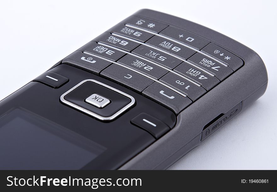 A modern 3G mobile phone on white background