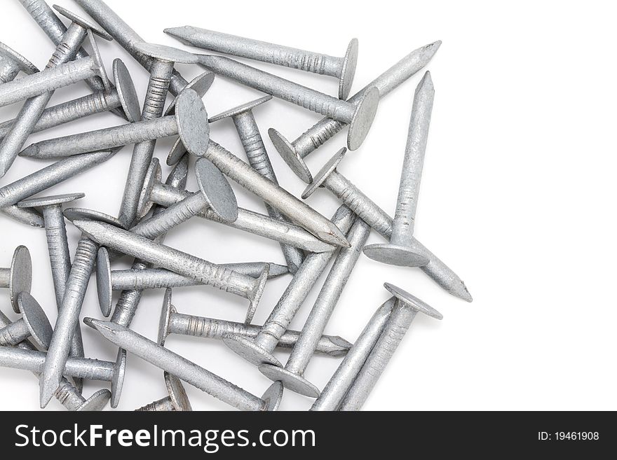 Galvanized steel nails on white background. Galvanized steel nails on white background