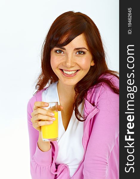 Portrait of beautiful young lady with glass of orange juice. Portrait of beautiful young lady with glass of orange juice