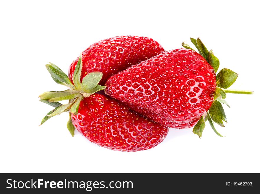 Closeup of strawberries isolated over white background