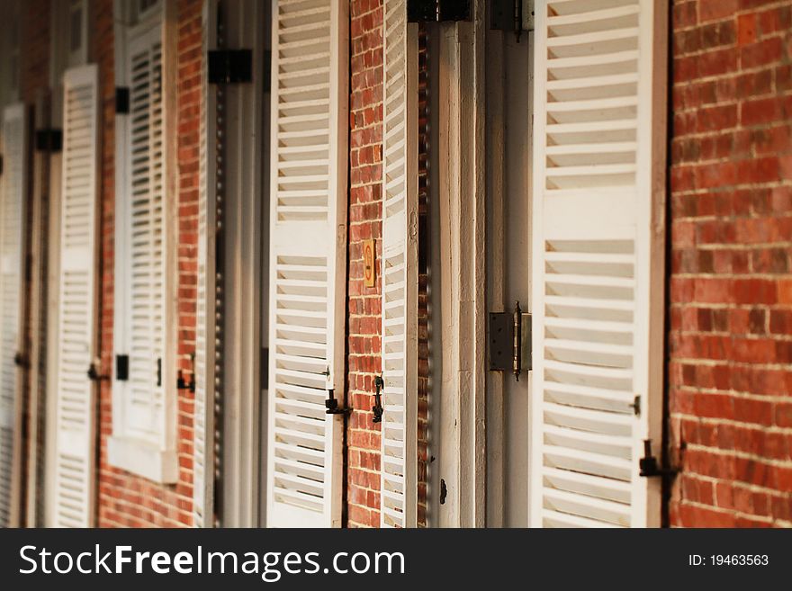 The red brick and white window