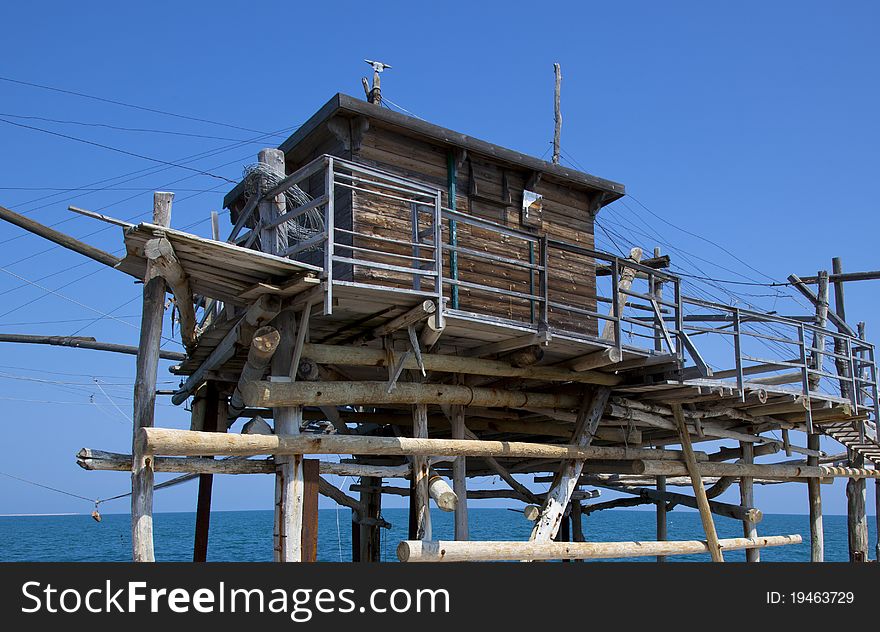 A trabucco in Italy with blue sky