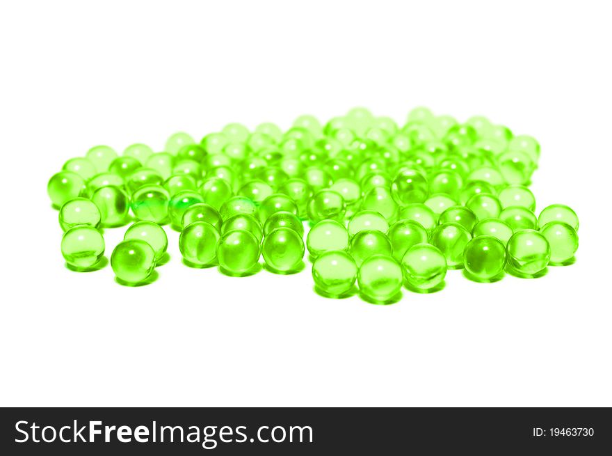 Photo of the Green capsules on white background