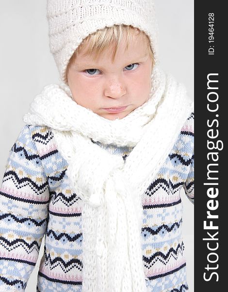 Cute toddler in winter clothes