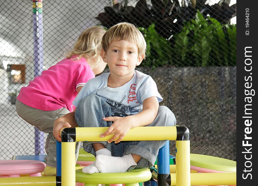 Two children on playground in airport