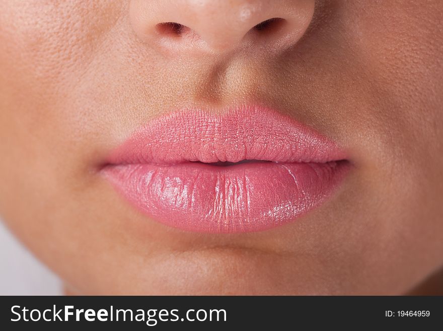 woman lips with pink make up. woman lips with pink make up.