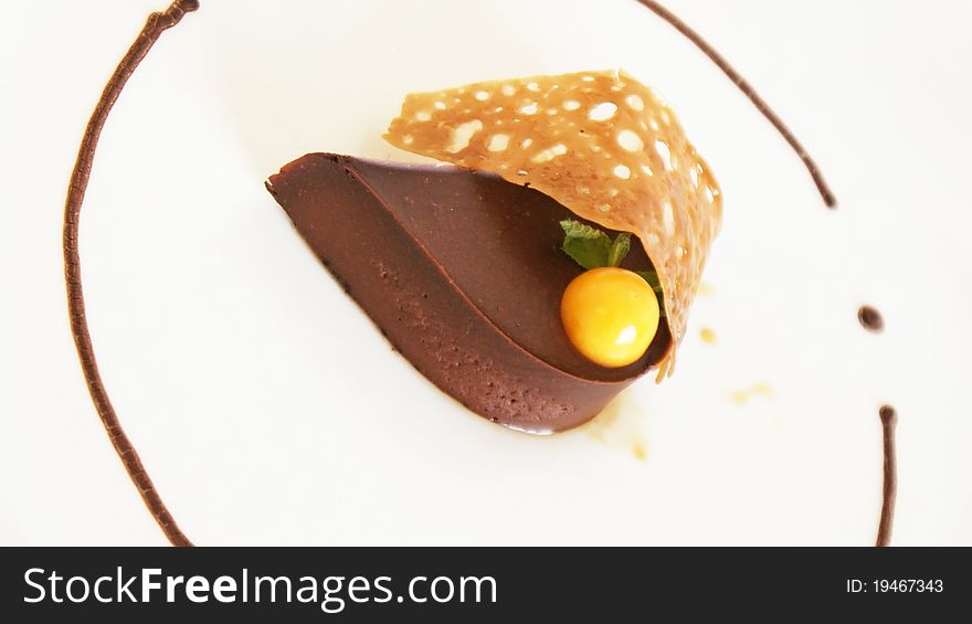 Chocolate cake on white plate