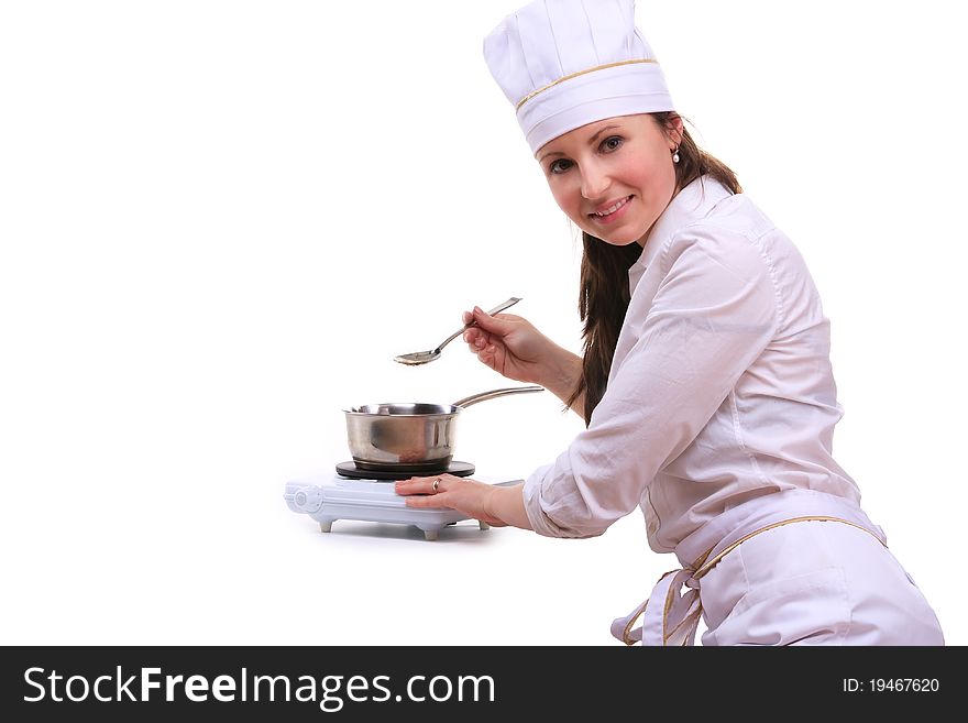 Beautiful young woman cooking isolated white background. Beautiful young woman cooking isolated white background