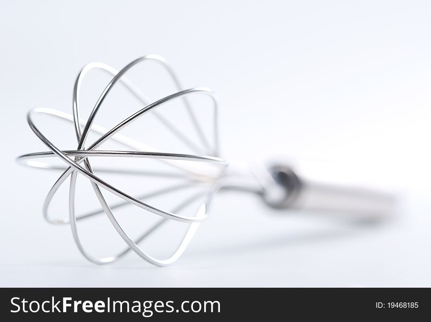 Kitchen whisk isolated on white