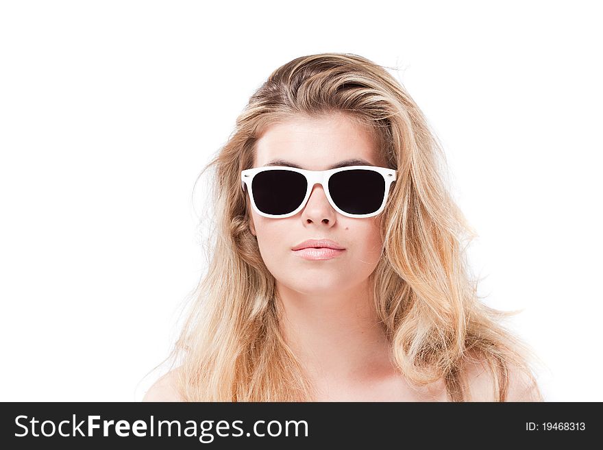 Beautiful blonde woman in sunglasses, front view