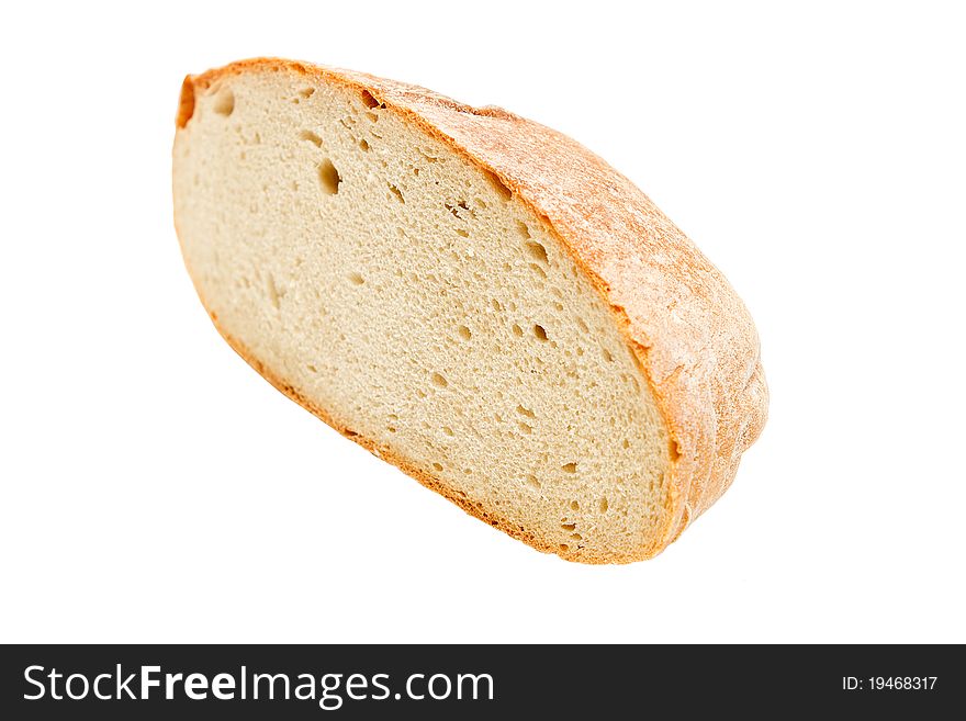 Half of home made bread isolated on white background