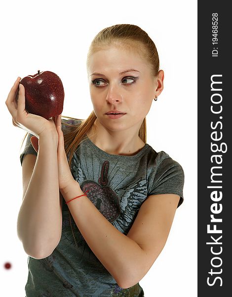 The blonde with an apple on a white background