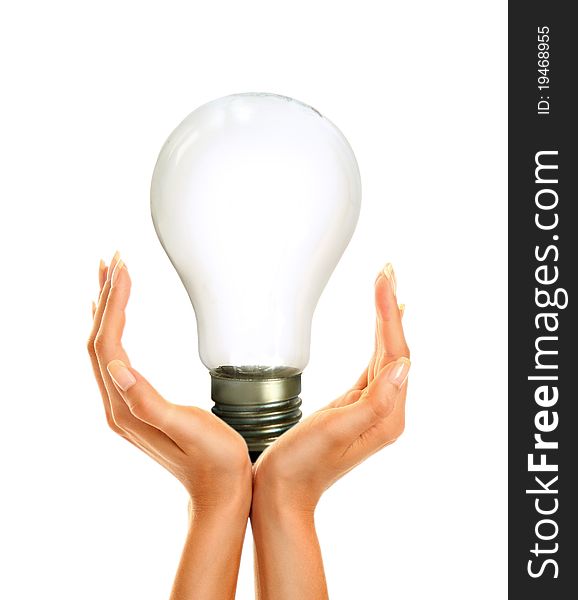 Woman's hands holding shiny lamp. Woman's hands holding shiny lamp