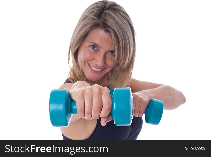 Active Woman doing exercises with dumbels