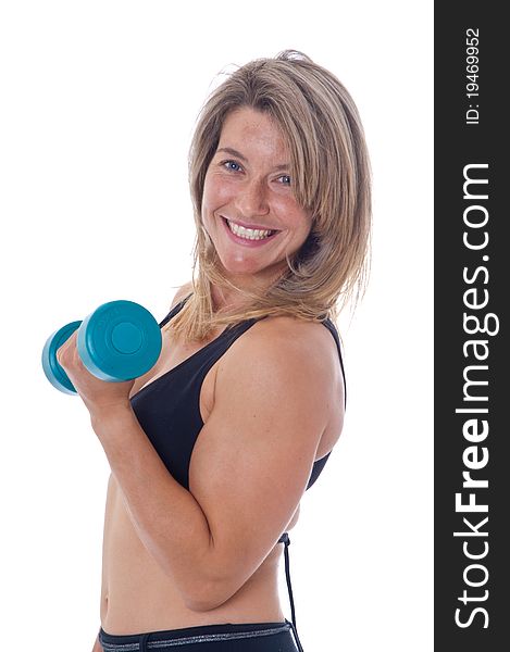 Active Woman doing exercises with dumbels