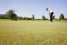 Female Golf Player Putting. Royalty Free Stock Photos Female Golf Player Putting. Royalty Free Stock Photos