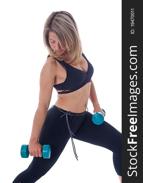 Active Woman doing exercises with dumbels