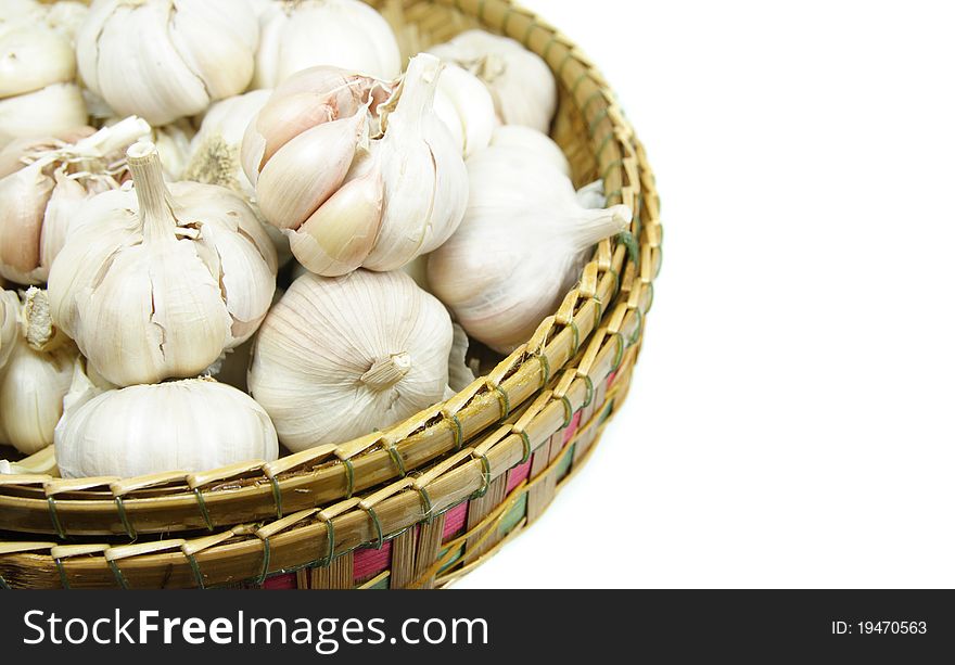 Garlic bulbs in a wicker basket