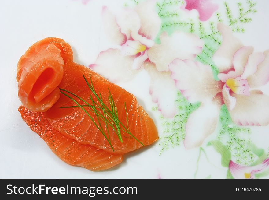 Smoked salmon seshimi on dish