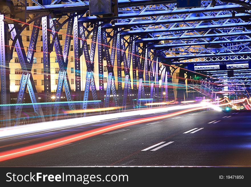 Shanghai old garden bridge car light trails