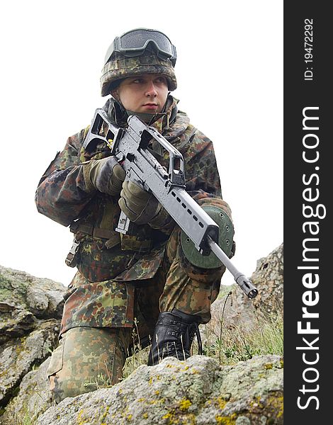 Soldier With Automatic Gun Covering