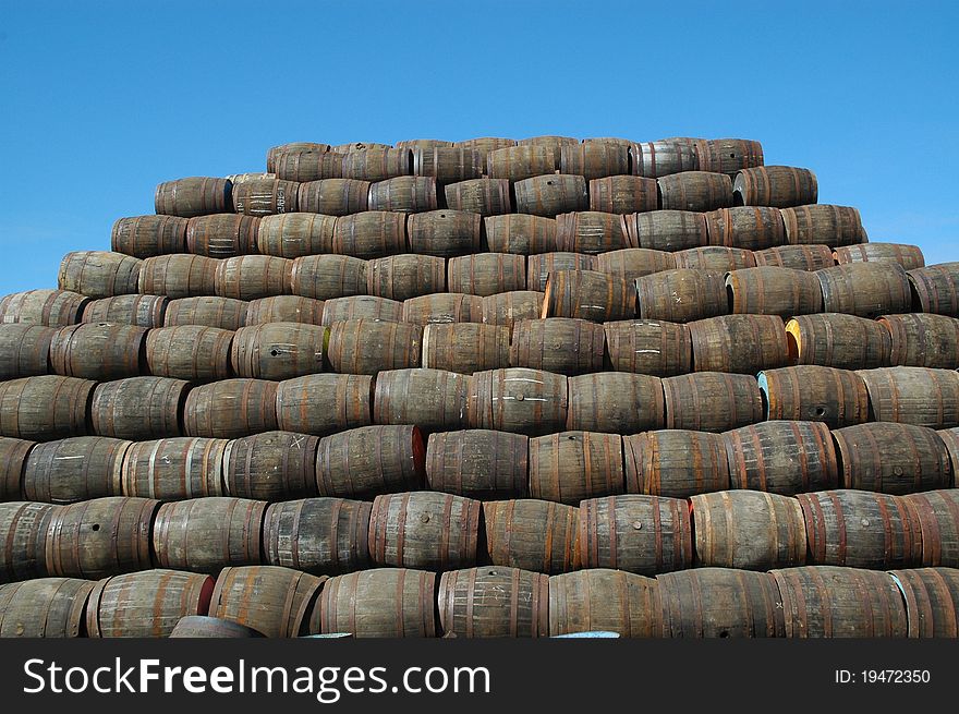 Stacked whisky barrels in a cooperage in scotland