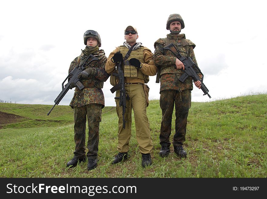 Three Soldiers Outdoors Posing