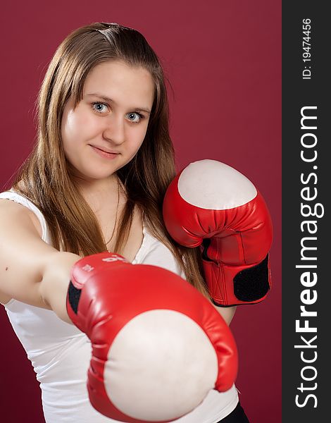 Portrait Of Girl In Boxing Gloves