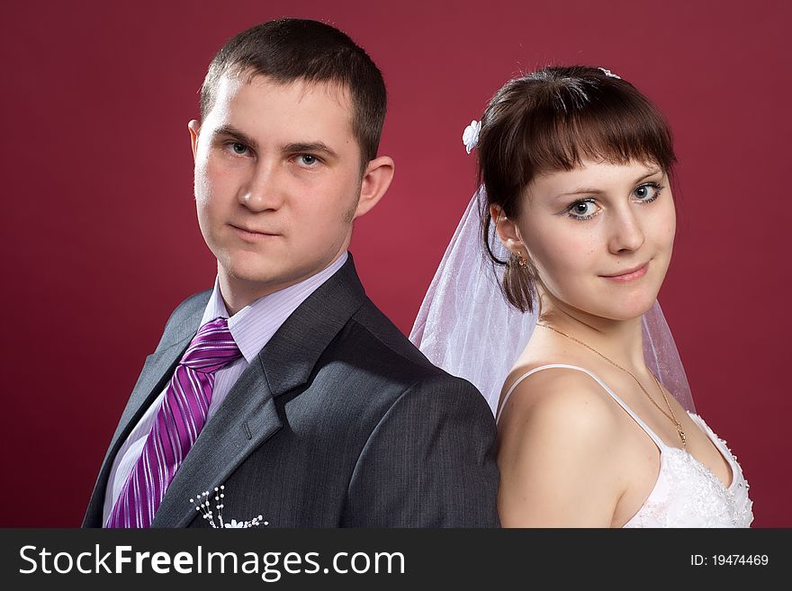 Couple Newlyweds In Wedding Dress And Suit