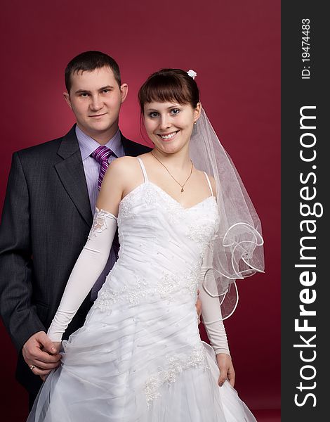 Couple Newlyweds In Wedding Dress And Suit